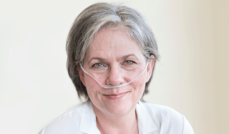 Women wearing nasal cannula in the home